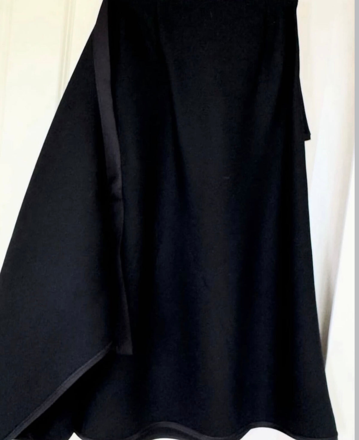 The Black Light Textured Wool Skirt