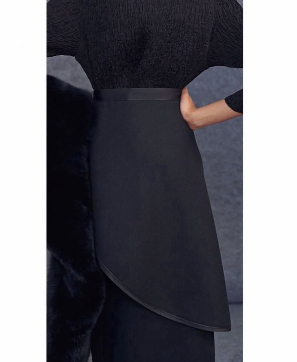 The Black Light Textured Wool Skirt