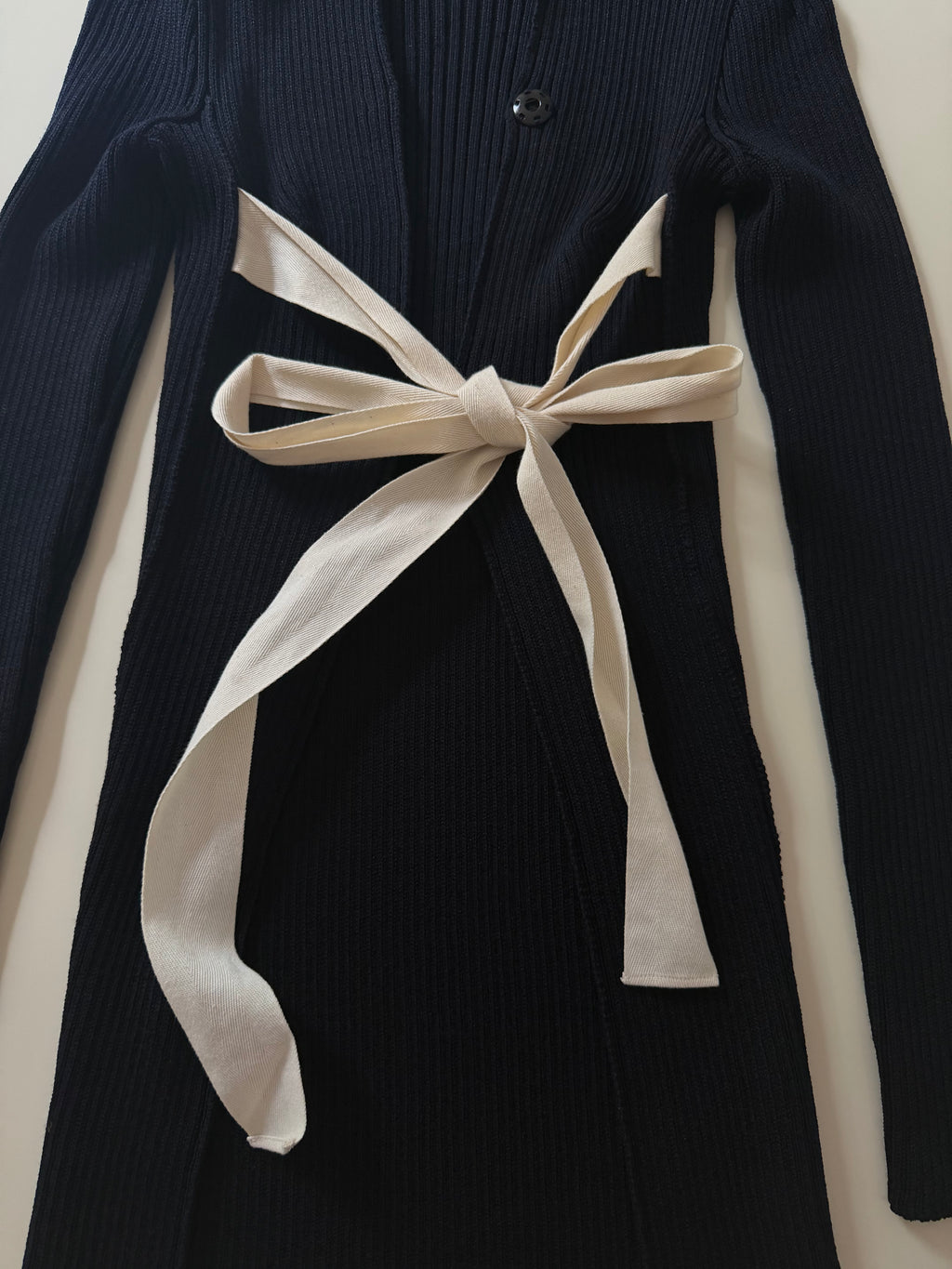 The Open Back Ribbed Cardigan with Iconic White Ribbons