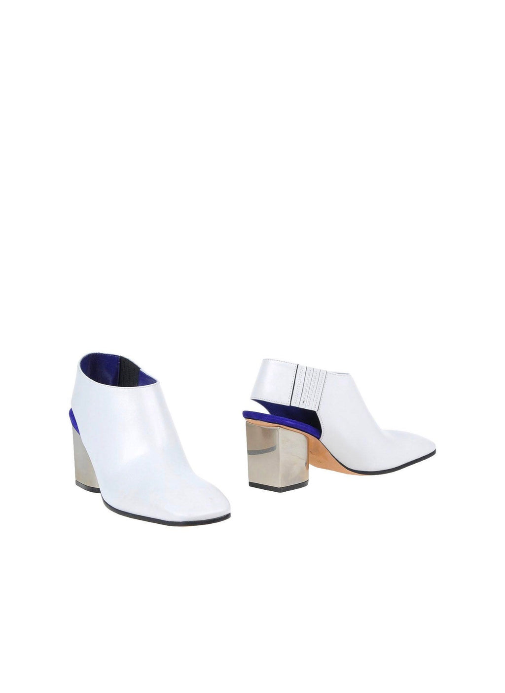 The Metal Heel Mules Flatlay