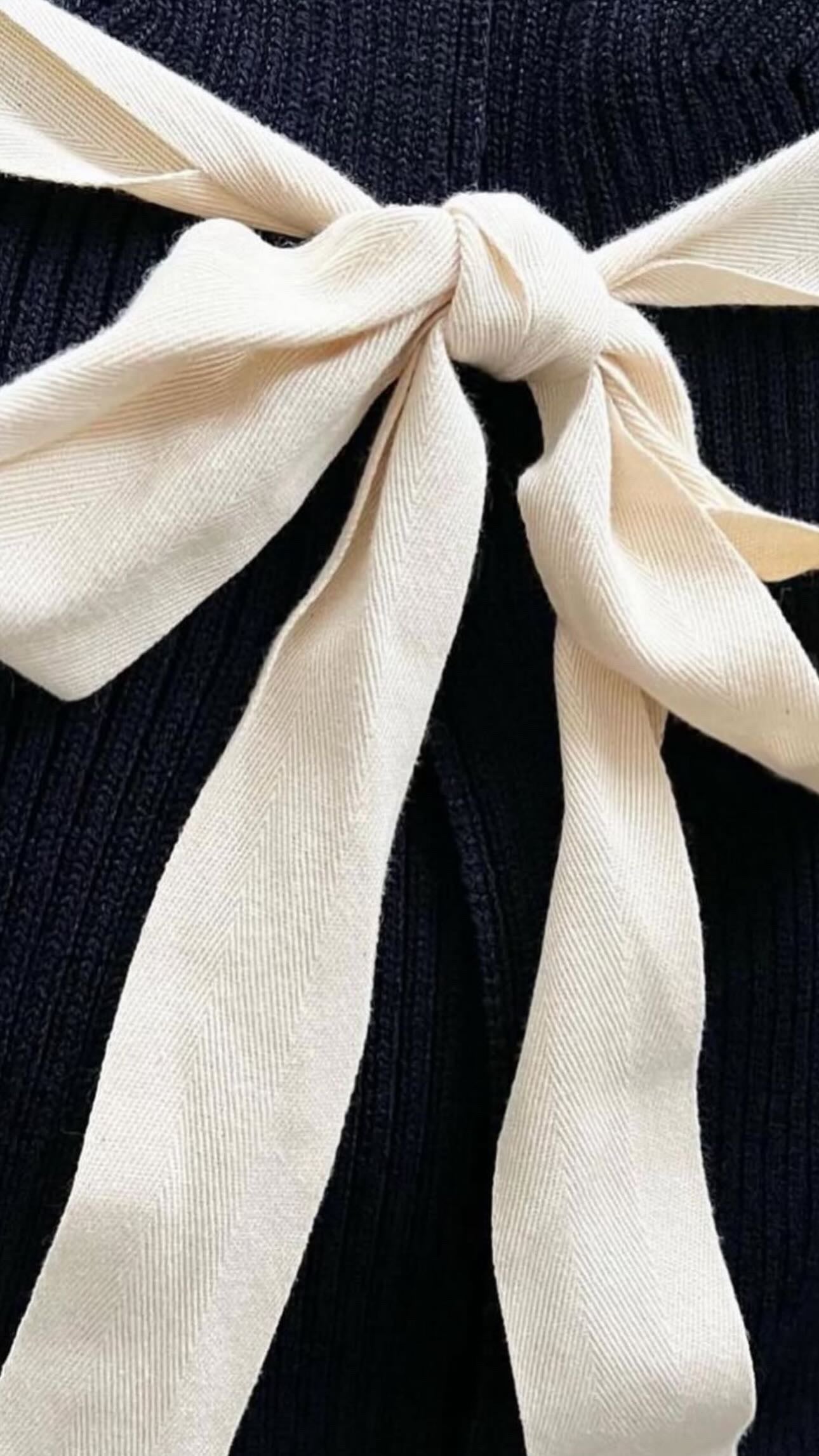 The Open Back Ribbed Cardigan with Iconic White Ribbons