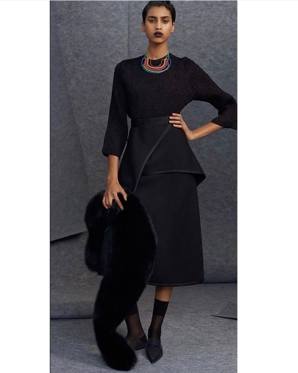 The Black Light Textured Wool Skirt