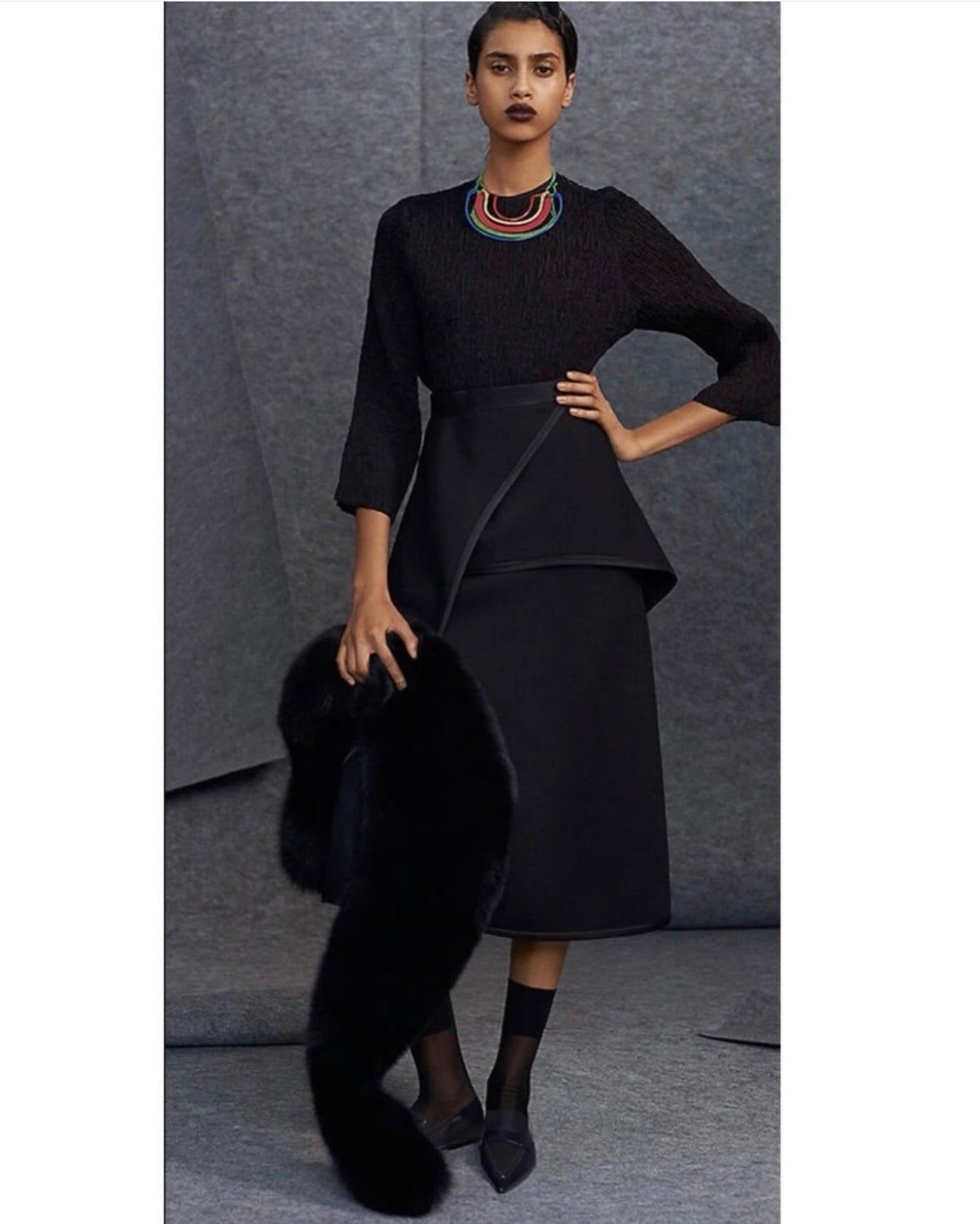 The Black Light Textured Wool Skirt