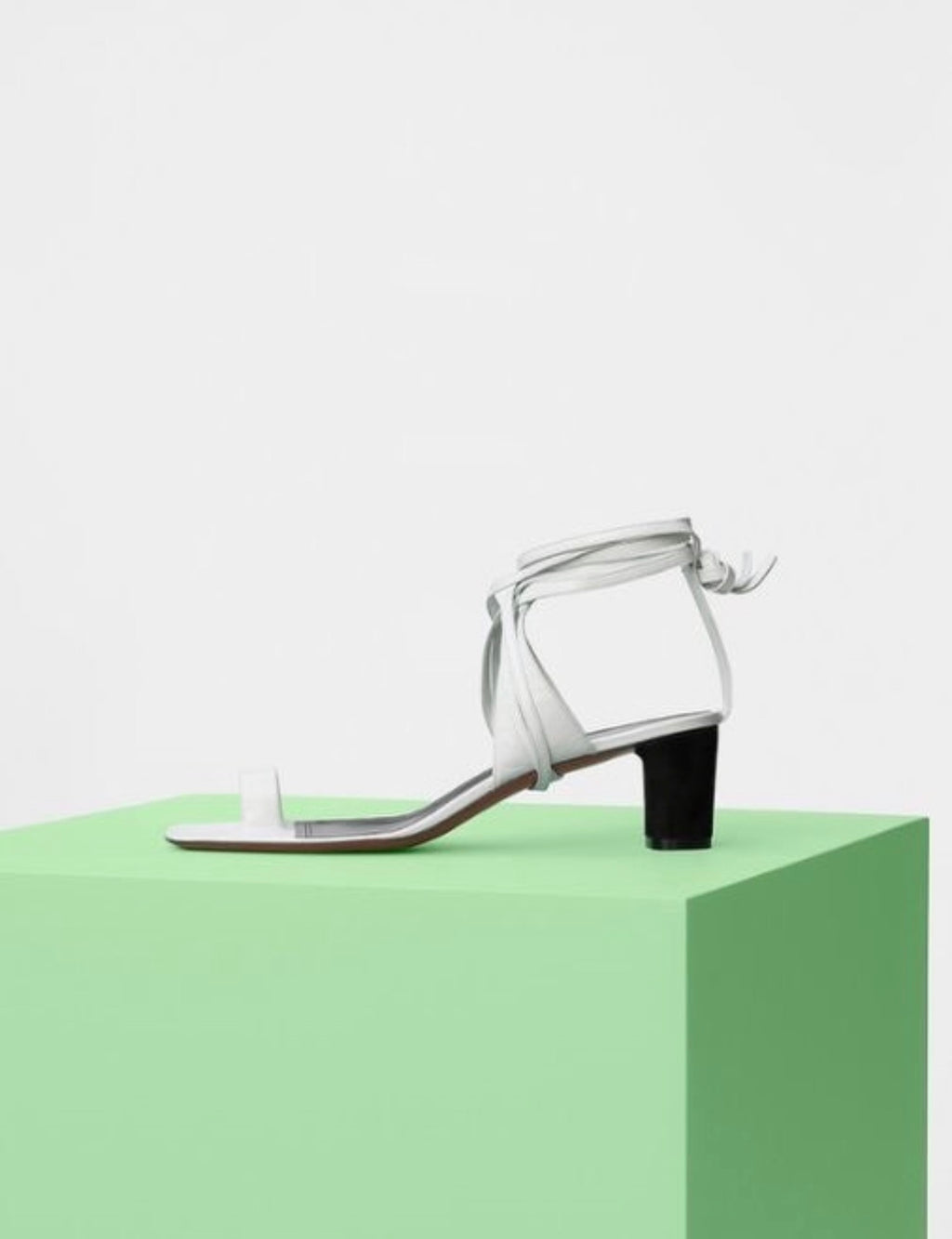 The White Toe Ring Sandals