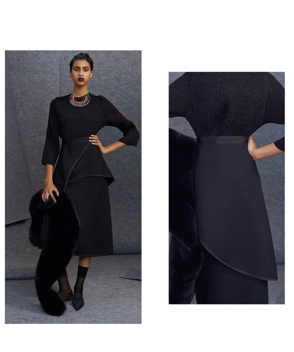 The Black Light Textured Wool Skirt