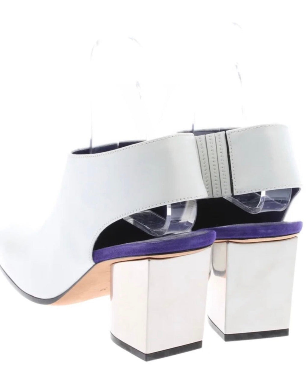 The Metal Heel Mules Flatlay