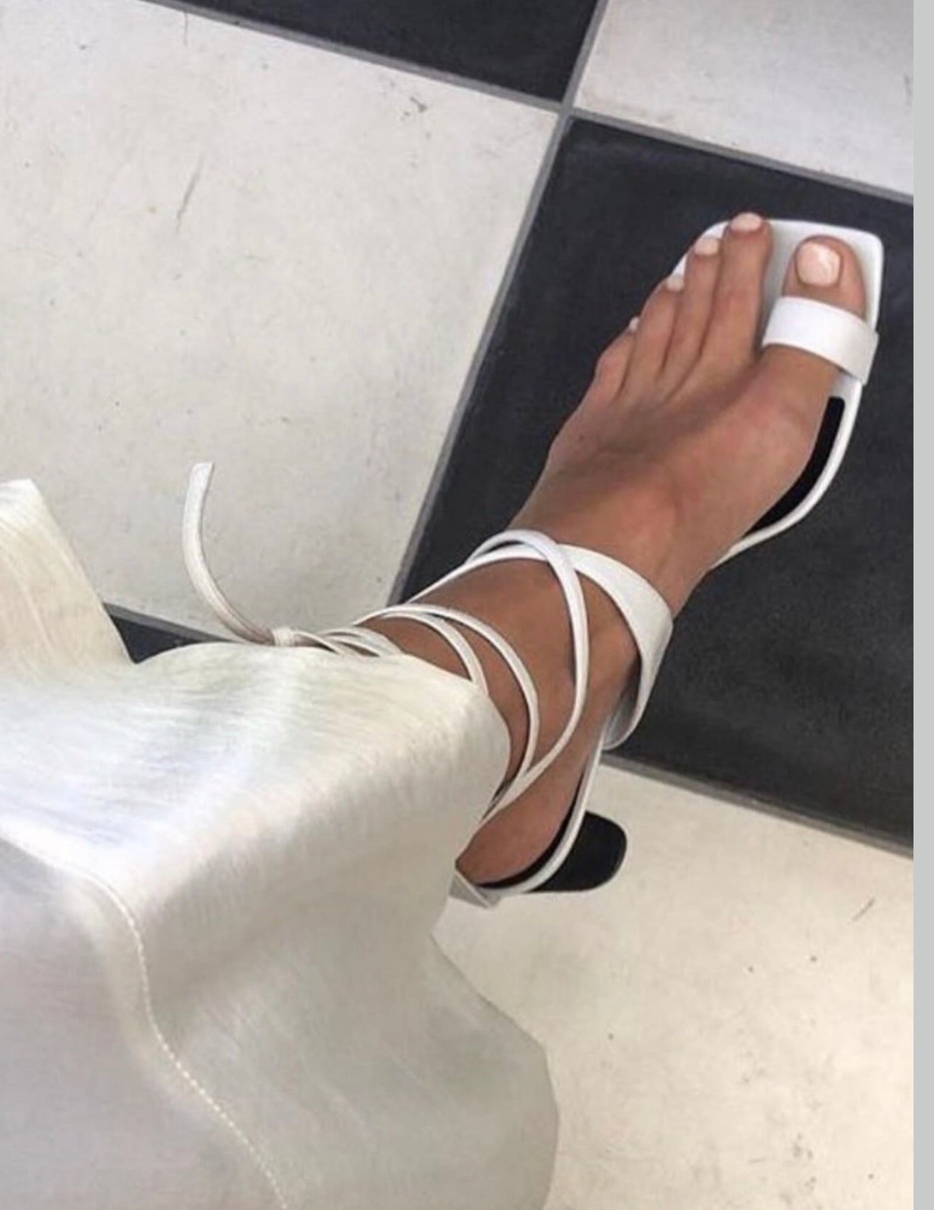 The White Toe Ring Sandals