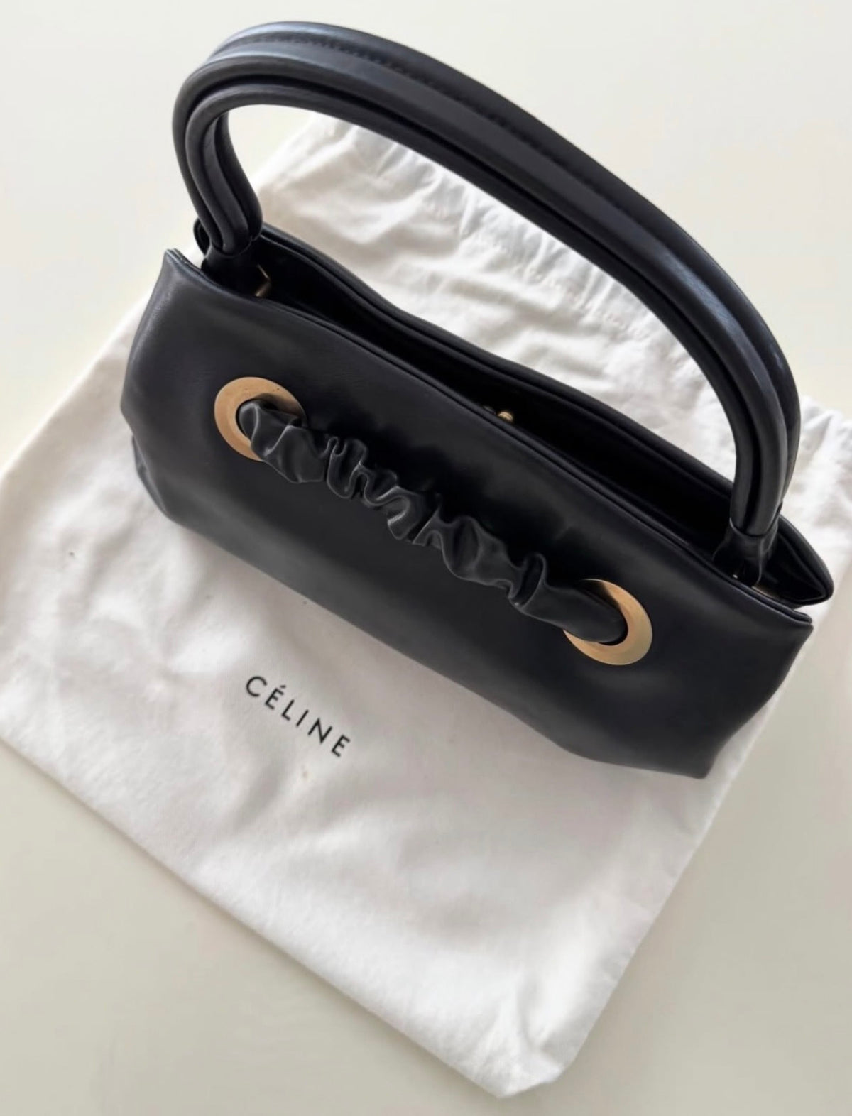 The Eyelet Purse Bag