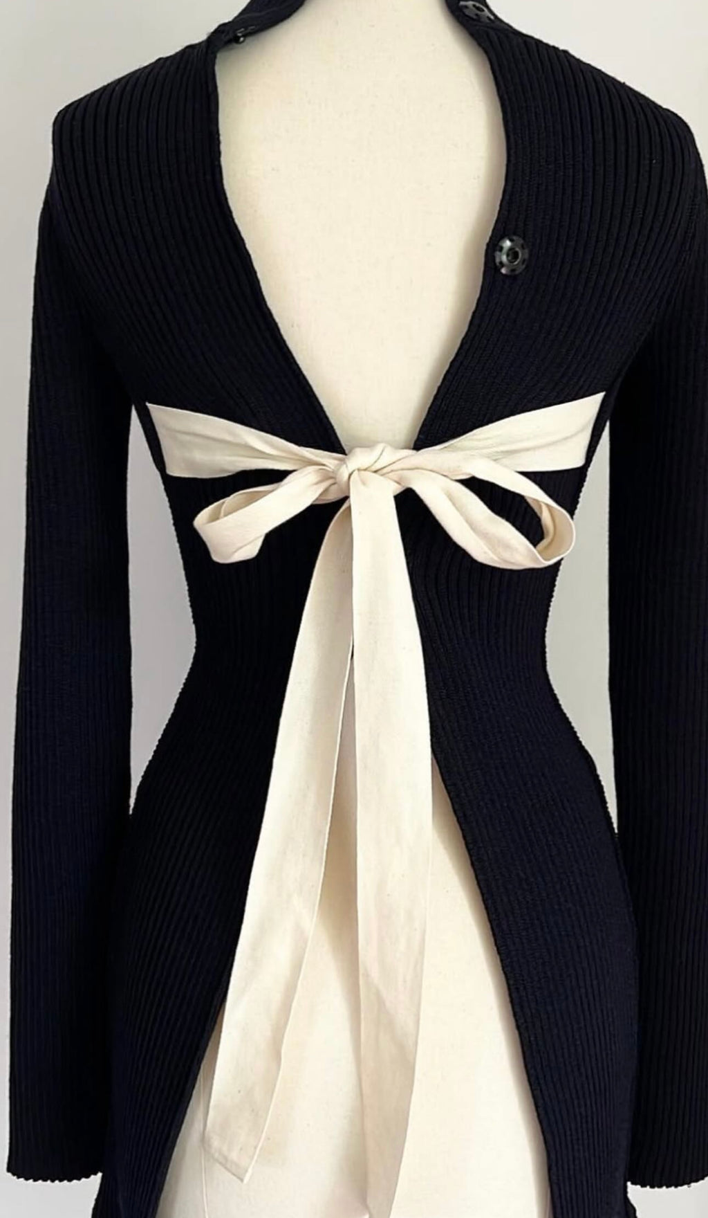 The Open Back Ribbed Cardigan with Iconic White Ribbons