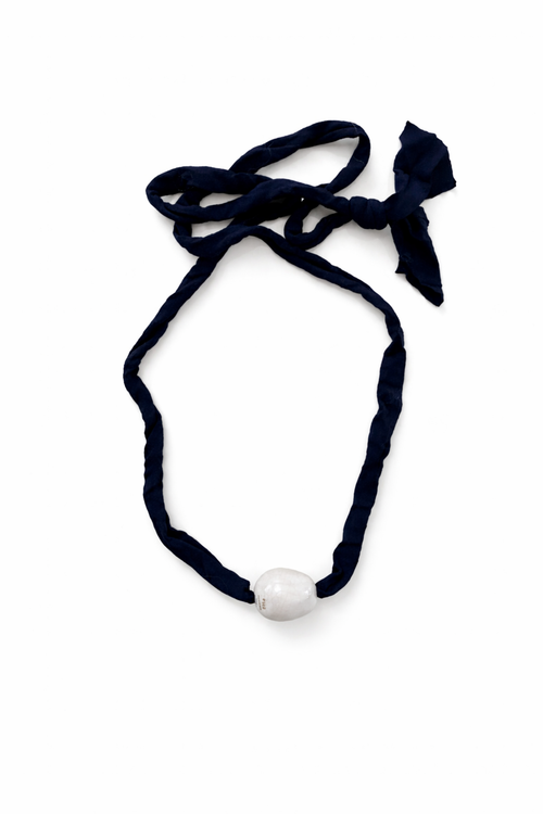 Limited Edition Numbered (No. 83/ 98) Porcelain Egg Necklace Flatlay