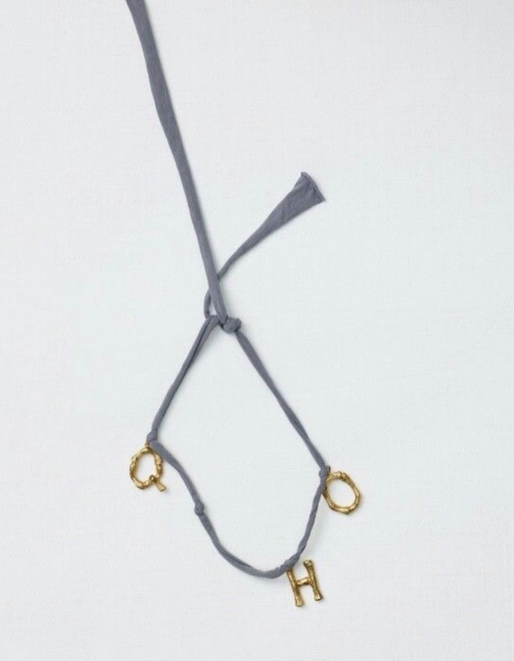 The Alphabet Jersey „Q“ Necklace in Blue Grey Jersey and Gold Brass