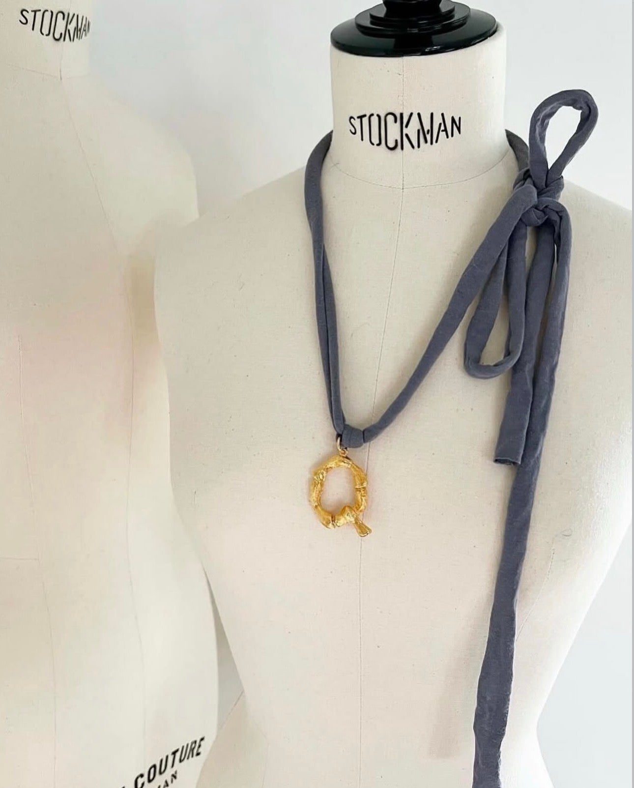 The Alphabet Jersey „Q“ Necklace in Blue Grey Jersey and Gold Brass