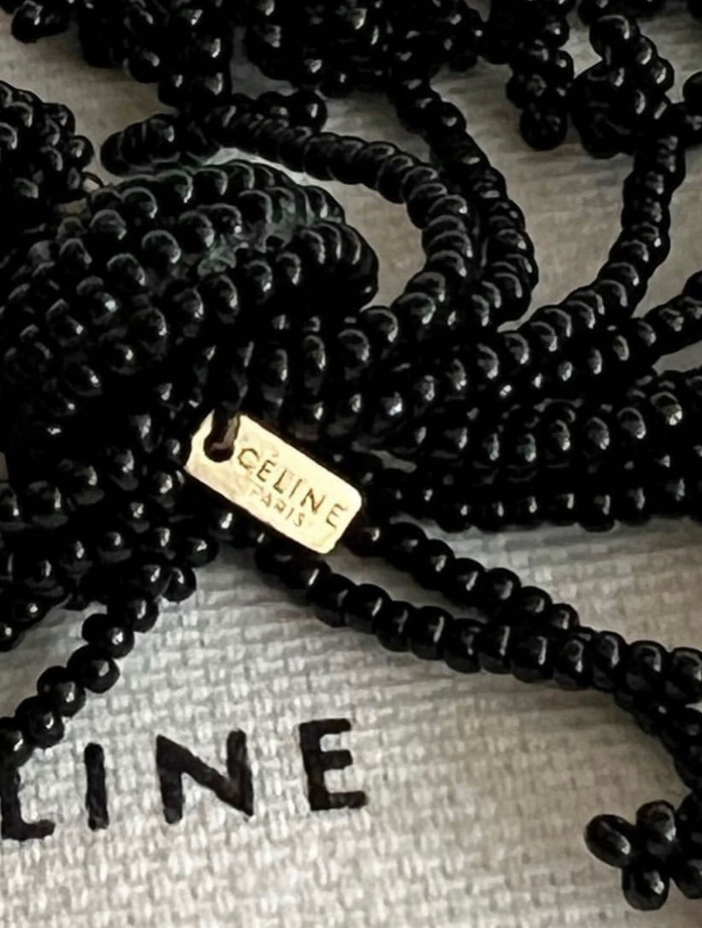 The Pompon Beads Earrings in Black Glass and Brass