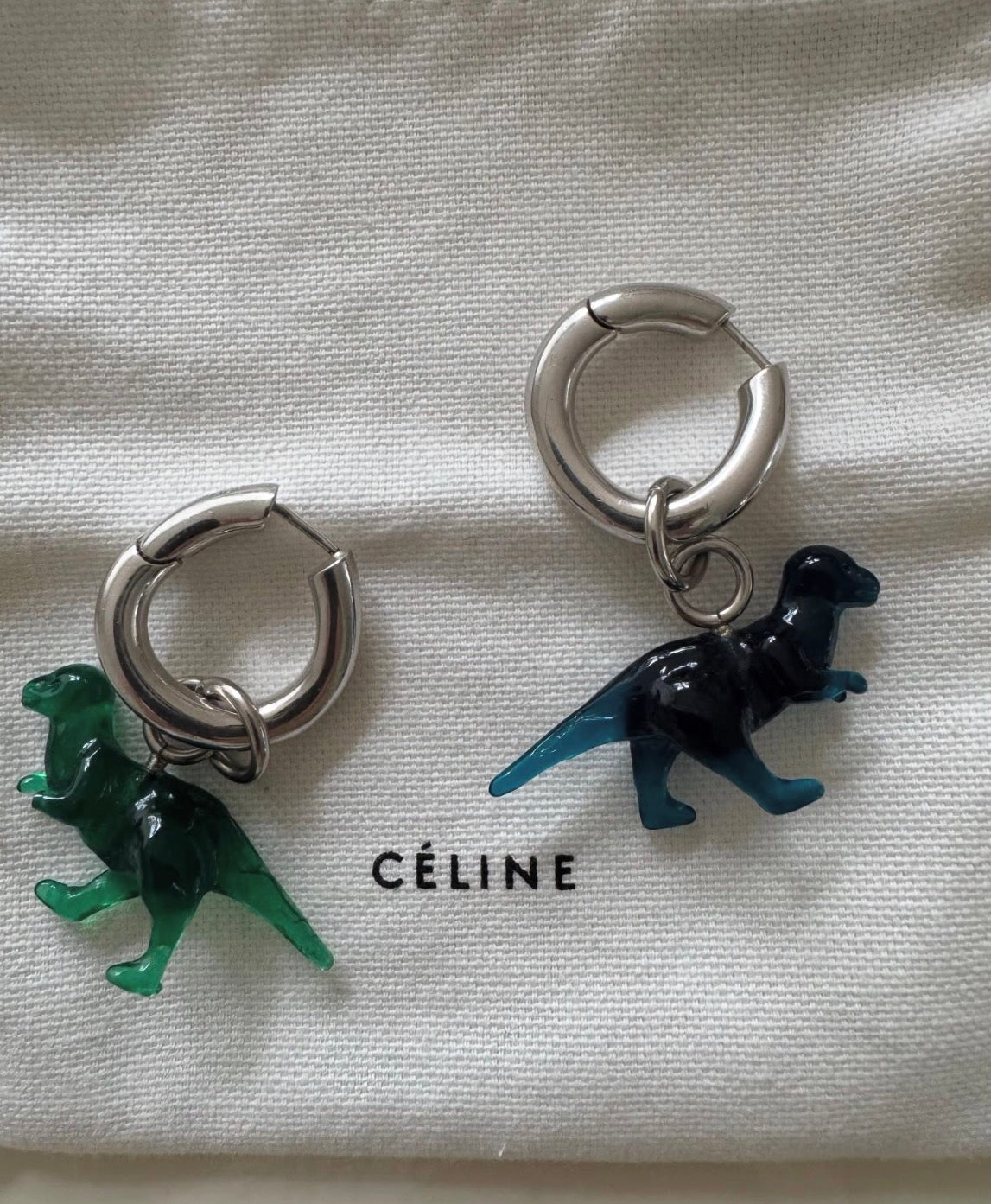 The Toy Small Dinosaur Earrings in Blue And Green Resin