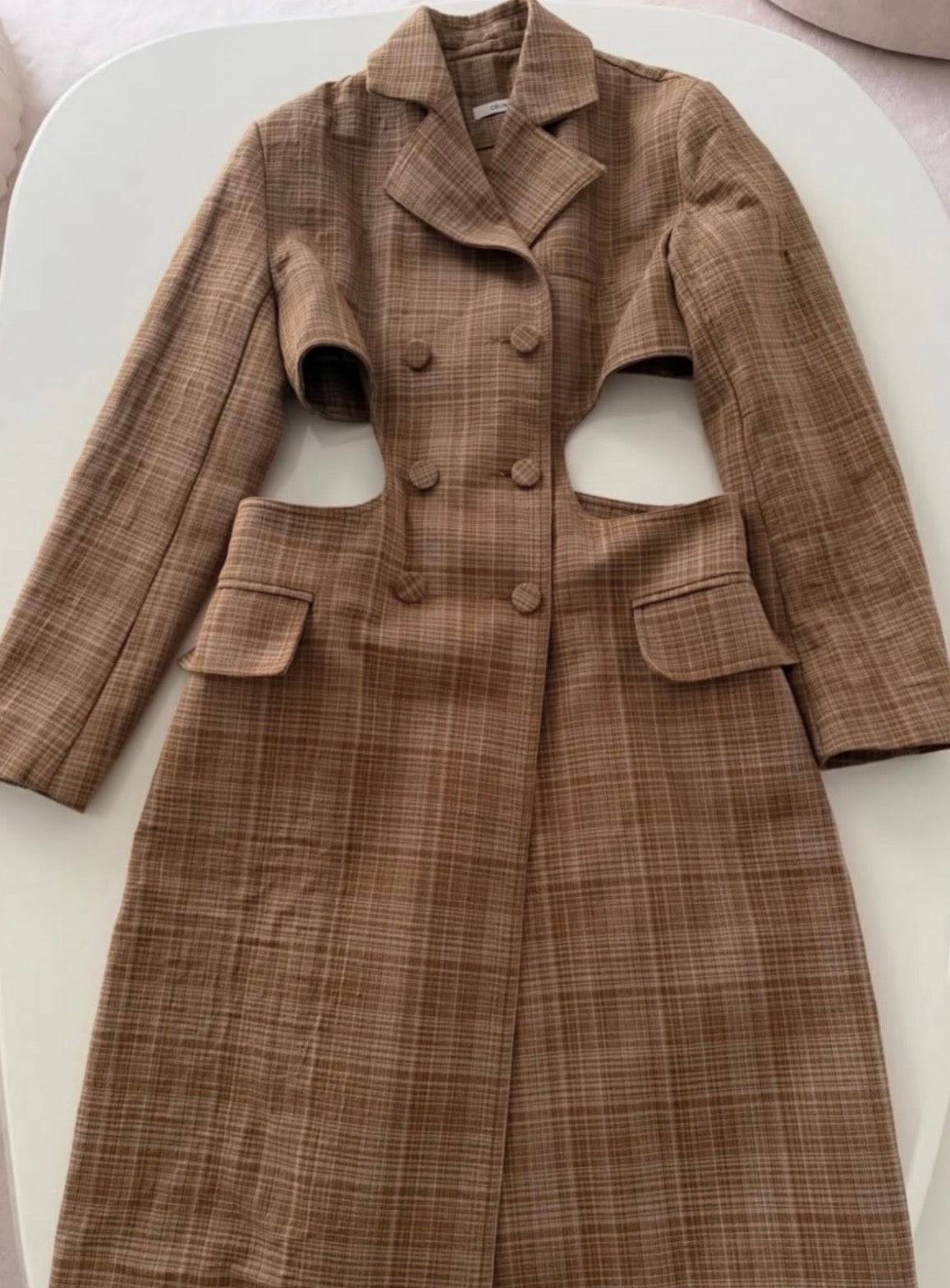 The 2017 Cut Out Twisted Coat