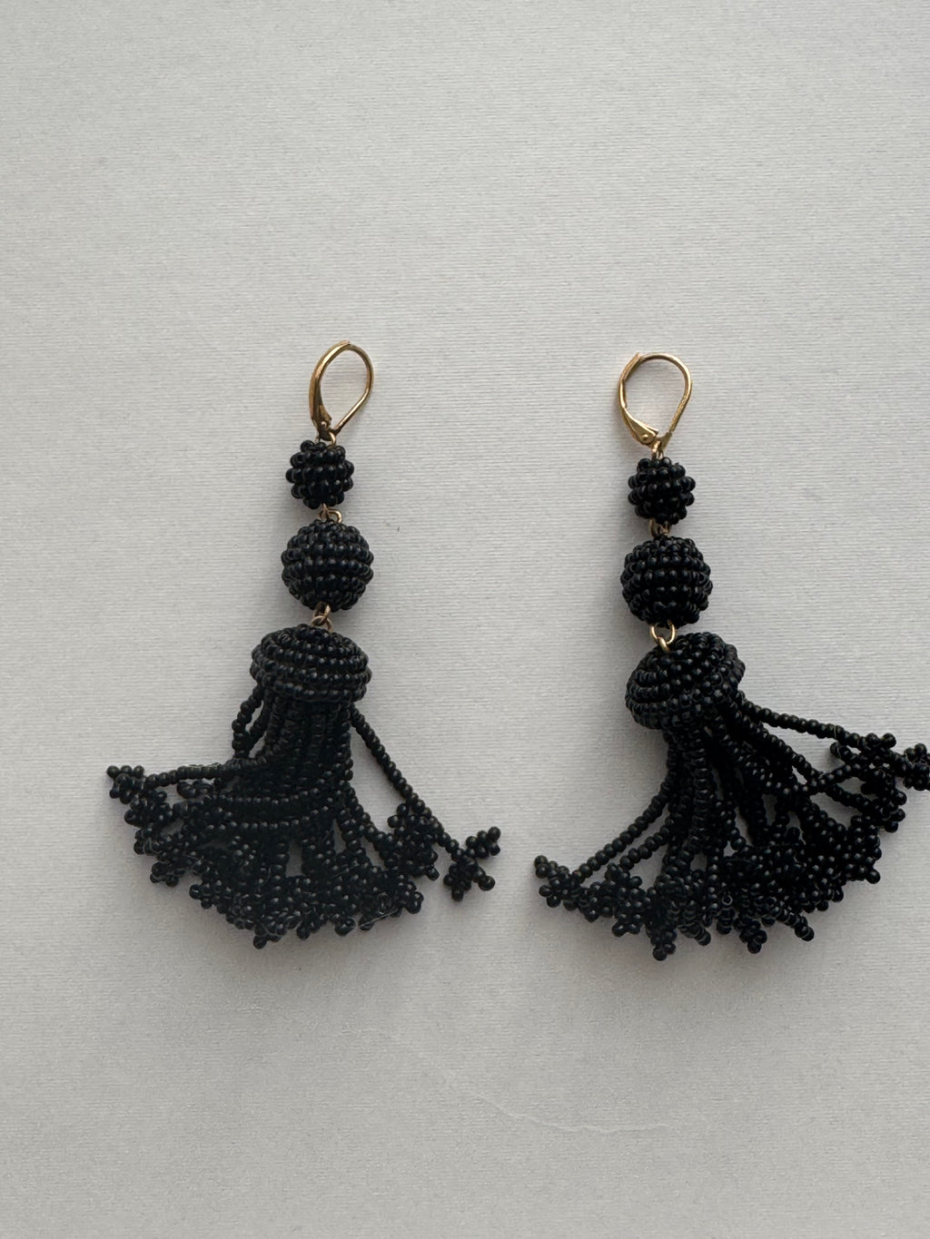 The Pompon Beads Earrings in Black Glass and Brass