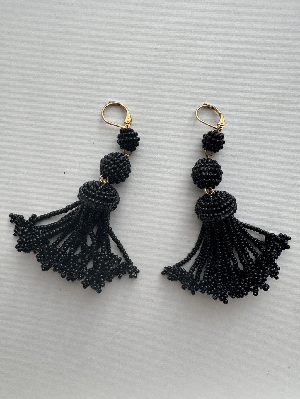 The Pompon Beads Earrings in Black Glass and Brass